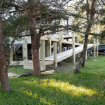 A multi-tier wheelchair ramp the crew is constructing for a displaced resident