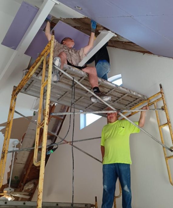 Disaster Relief Ministry volunteers repair a ceiling in Little Gasparilla, Florida in October.